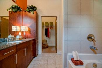 Oval garden tub with separate enclosed shower